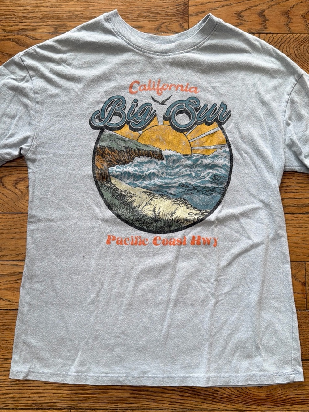 Cold Crush Big Sur Graphic Tee in Light Blue with Yellow Sun